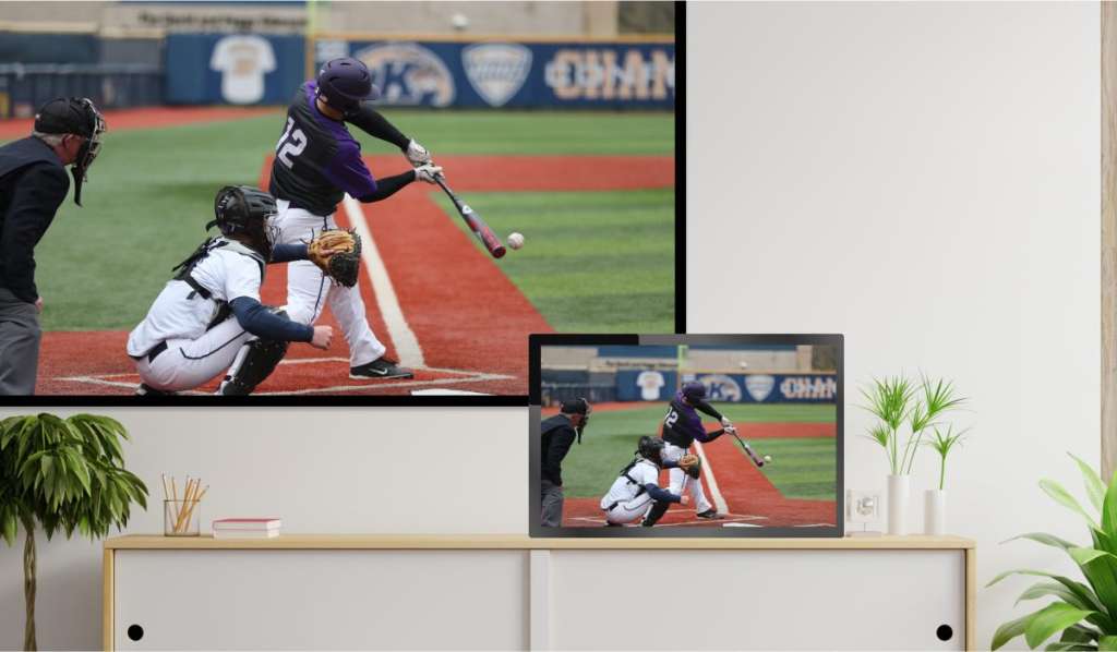 An iPad on a drawer casting an image of baseball match to a wall-mounted Hitachi TV, without a Wireless Display Hitachi