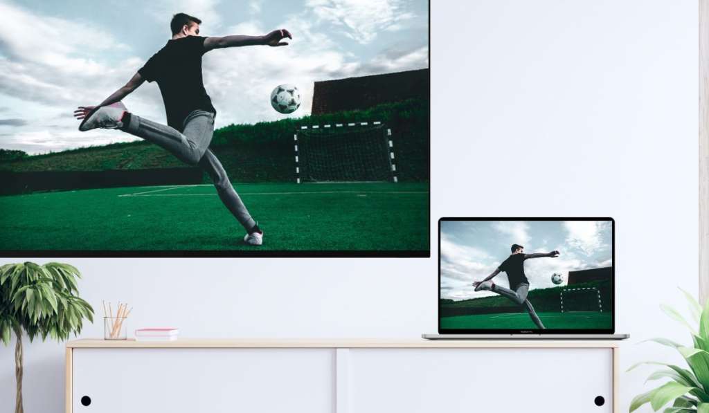 Screen mirroring soccer from MacBook to a wall-mounted Toshiba TV