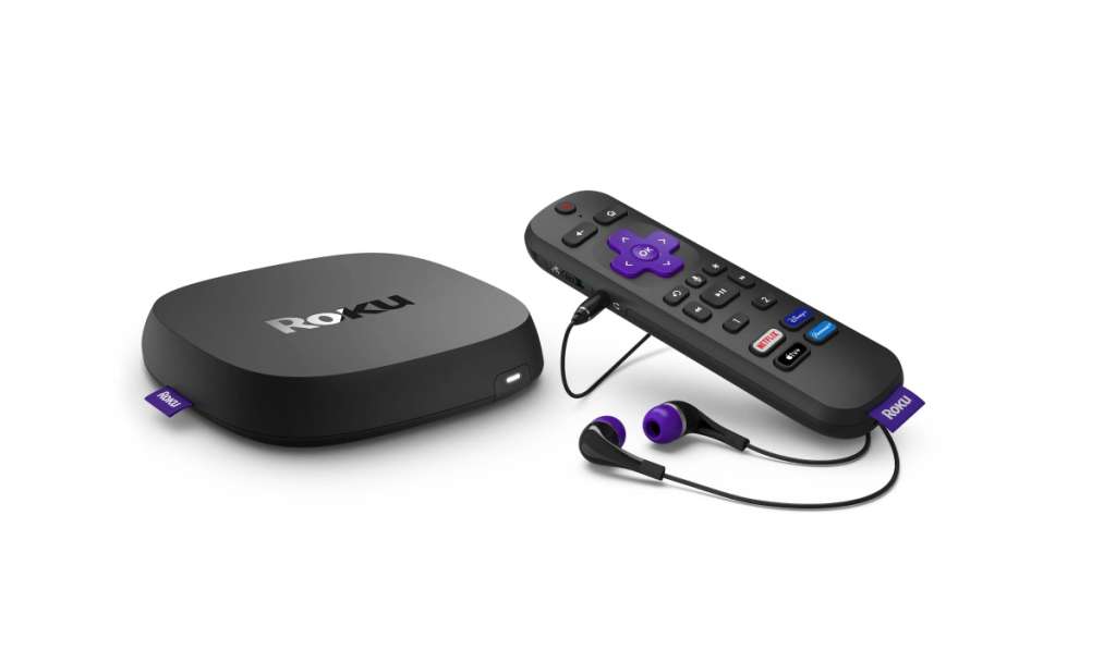 Roku Ultra device and a Roku remote with earphones plugged in